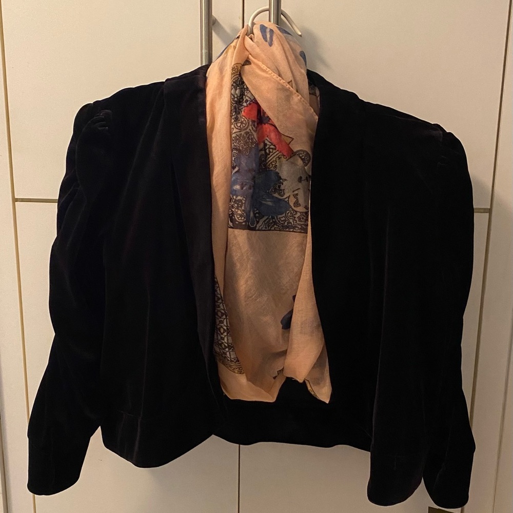 Velvet bolero jacket with puffed ruched sleeves.